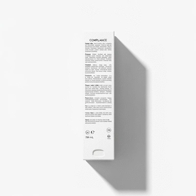 Cosmetic product packaging with clear labeling and regulatory information visible, on a clean, bright background