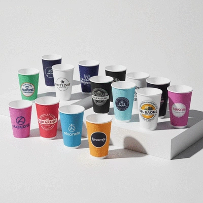 Custom polystyrene cups with various brand logos and colorful designs, arranged aesthetically on a clean surface, no text, no words, no typography, 8K, natural lighting