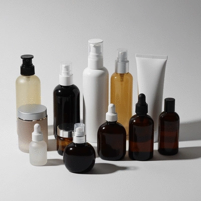 Assortment of cosmetic bottles on a clean background